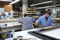 Experts work in the frame restoration studio